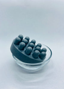 Our Activated Charcoal Massage Bar contains ingredients that are known to aid in relief of aching muscles and tension, promote soft skin and anti-aging, have antimicrobial properties, assist in detoxification and anti-inflammation of the skin and wash away dirt. Activated charcoal is made from coconut shells, washed for purity, and pH neutral.